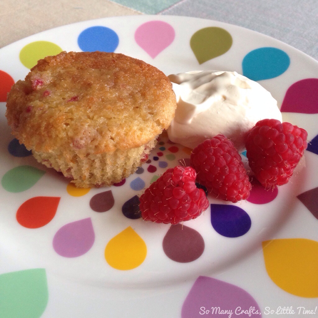 Orange Raspberry Cupcake Warm raspberry and orange cupcakes with an orange sugar drizzle - Hello ...